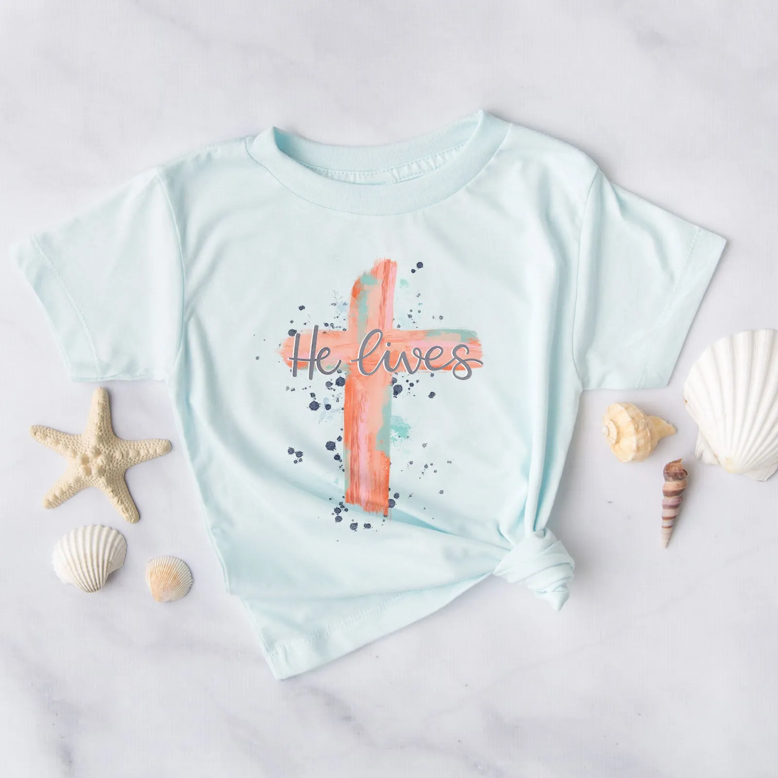 He lives Watercolor Cross Tee